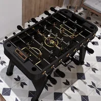 foosball table delivered and set up in a game room