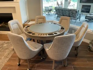 game table setup, round game table with chairs delivered and positioned