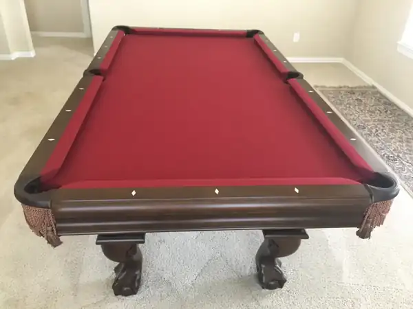 pool table movers Denton TX, new cloth installed on bed and rails