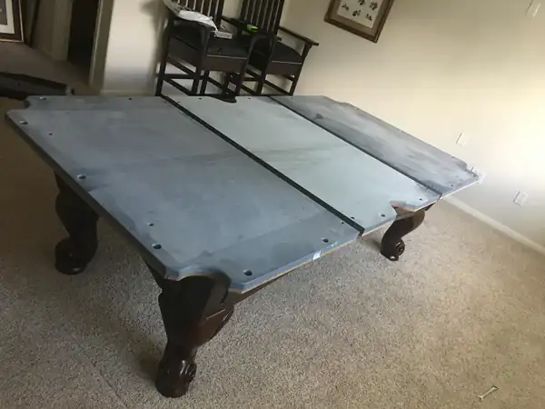 pool table moving service in Austin TX, game room table leveled with a machinist level