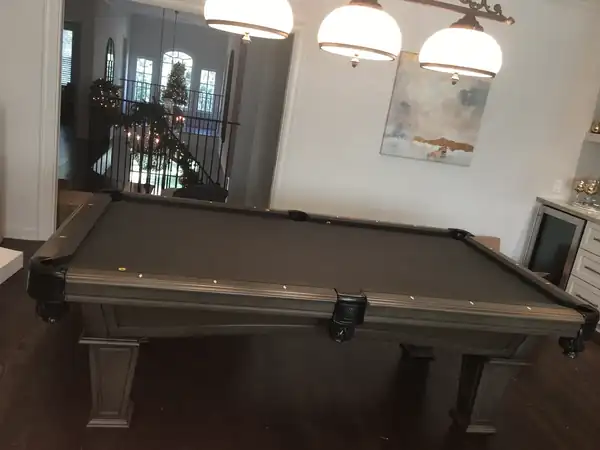 pool table disassembly and move Houston TX, new cloth installed on bed and rails