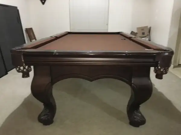 pool table setup and delivery Lubbock TX, new cloth installed on bed and rails