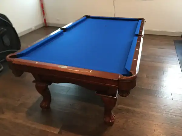 pool table disassembly and move Cedar Park TX, game room table leveled with a machinist level