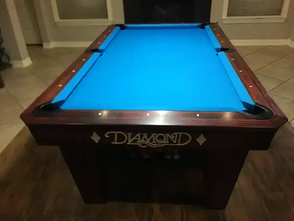 pool table installation Pasadena TX, game room table leveled with a machinist level